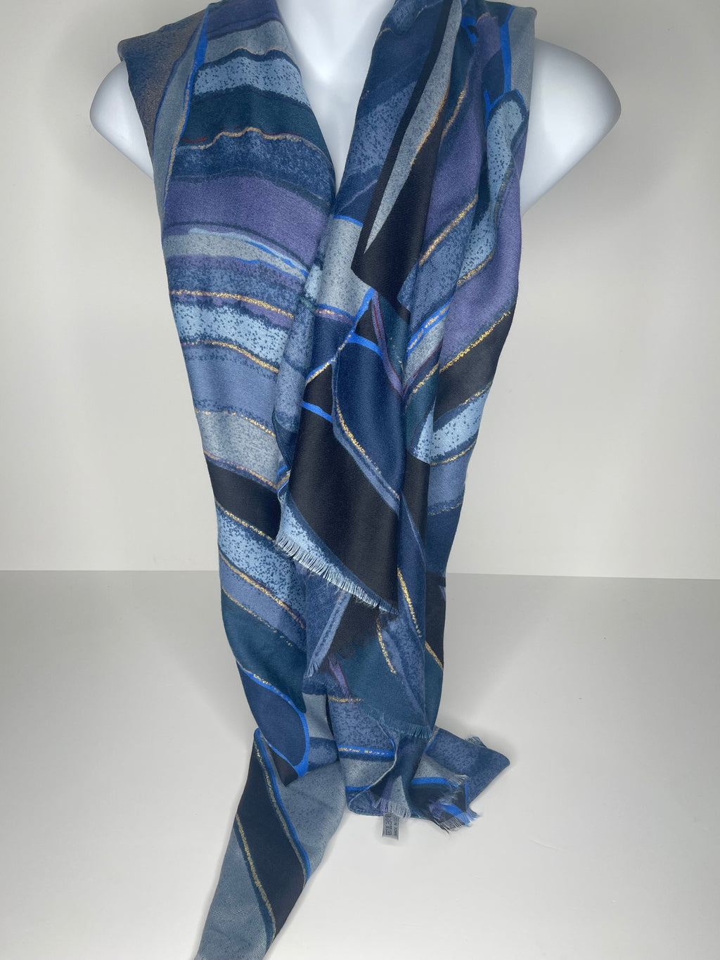 Lighter weight metallic gold line print scarf in shades of blue and black