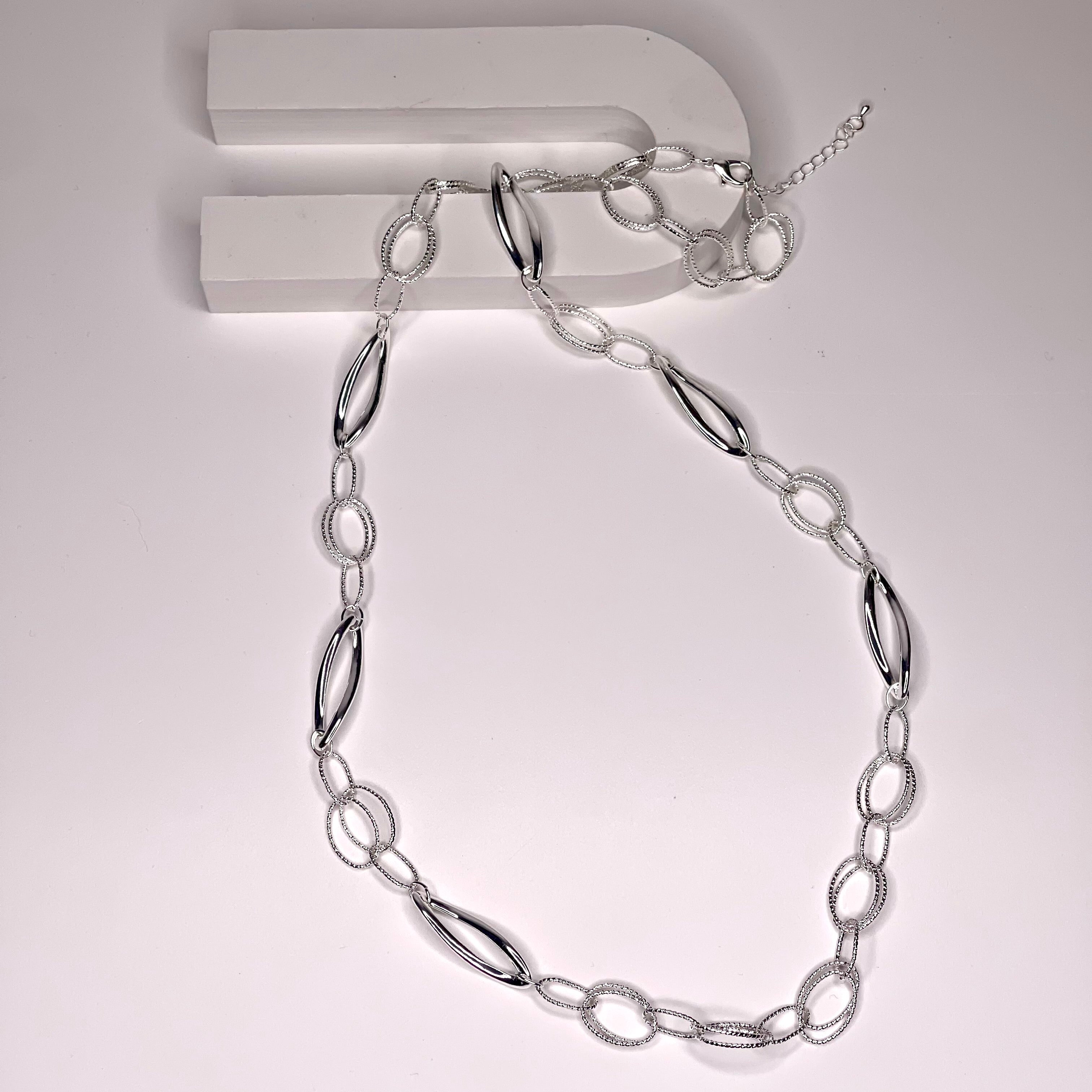 Long necklace, with silver interlinked circular loops