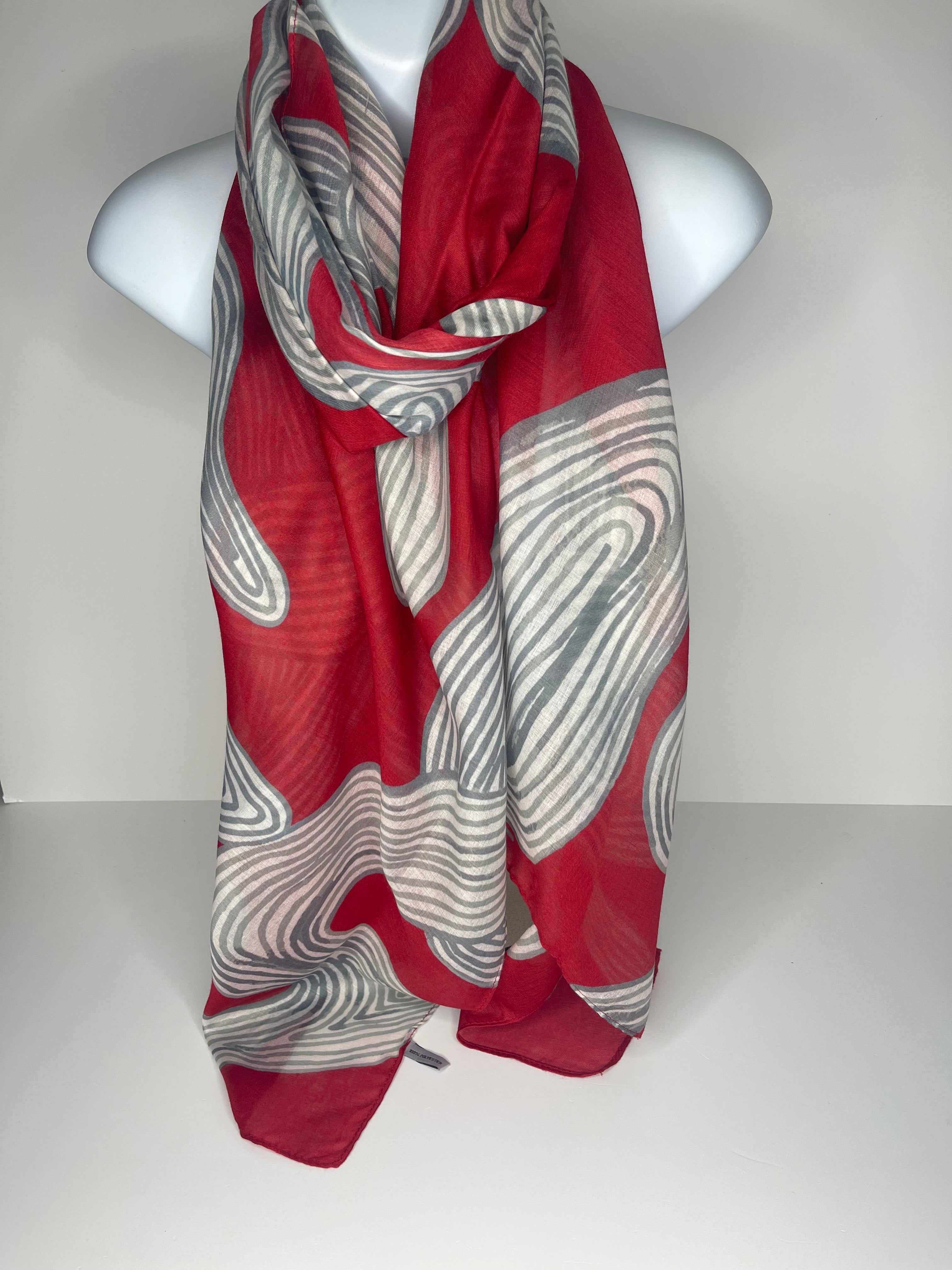 Lighter weight abstract grey and cream print scarf in shades of red