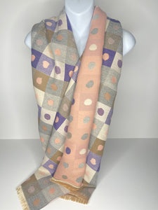 Winter weight, wool-mix, reversible, polka-dot print scarf in shades of light grey, pale pink, purple and beige