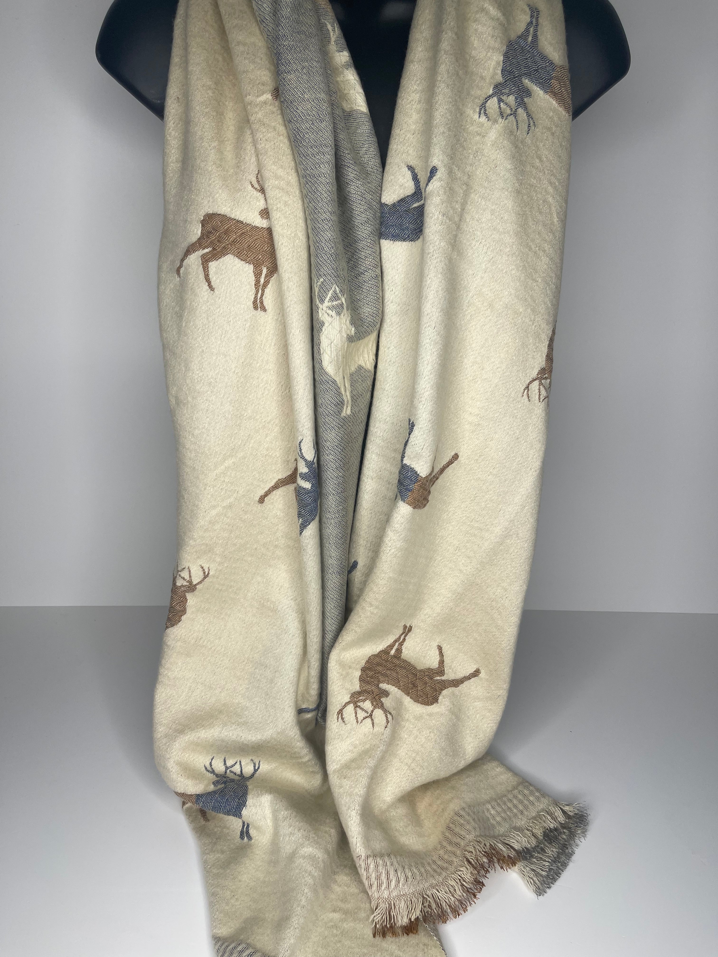 Winter weight, wool-mix, embossed deer print scarf in shades of winter white, grey and caramel