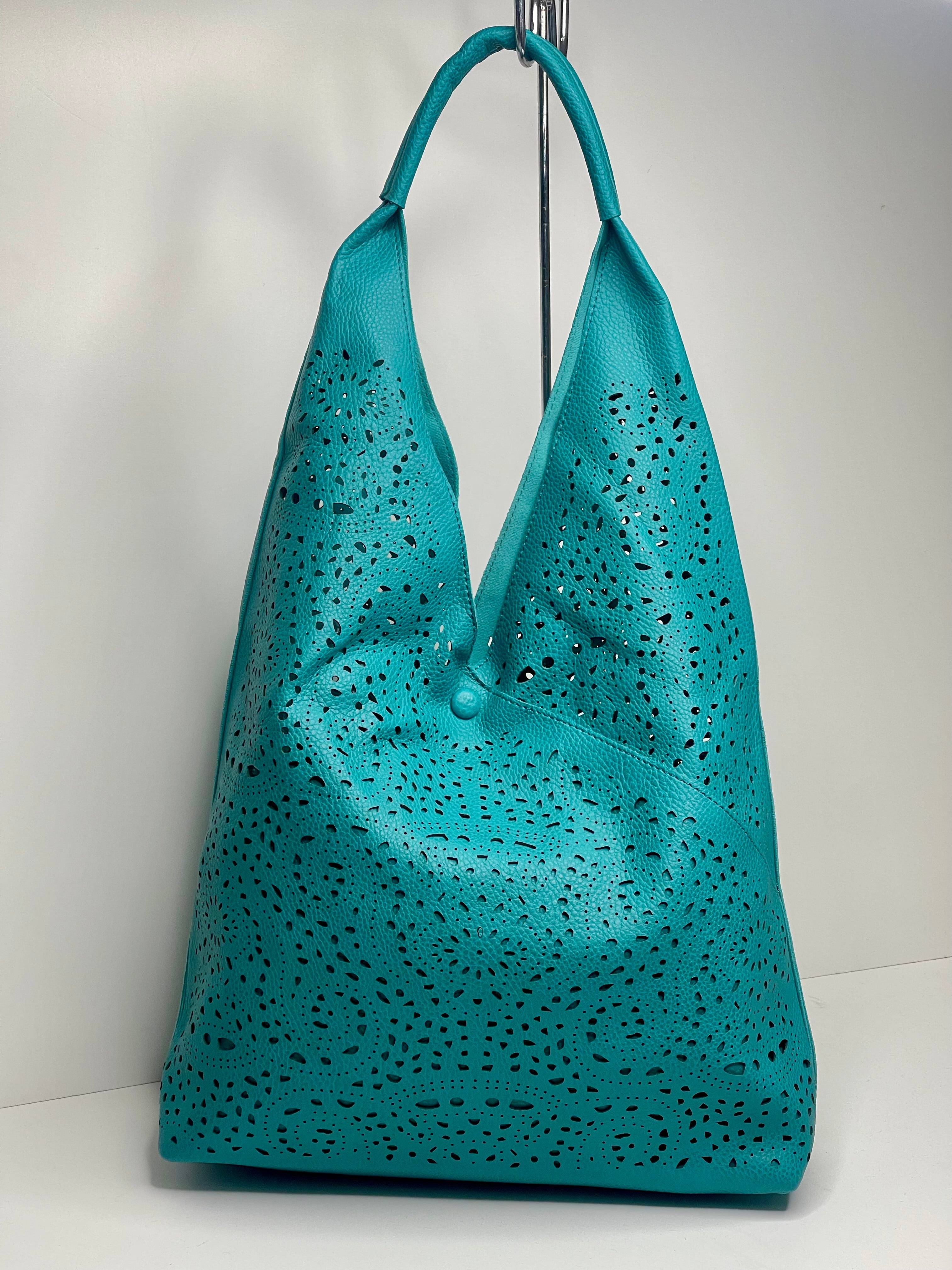 Turquoise laser cut shoulder bag - made from recycled water bottles - just like leather!