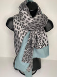 Winter weight leopard print scarf in shades of baby blue and grey