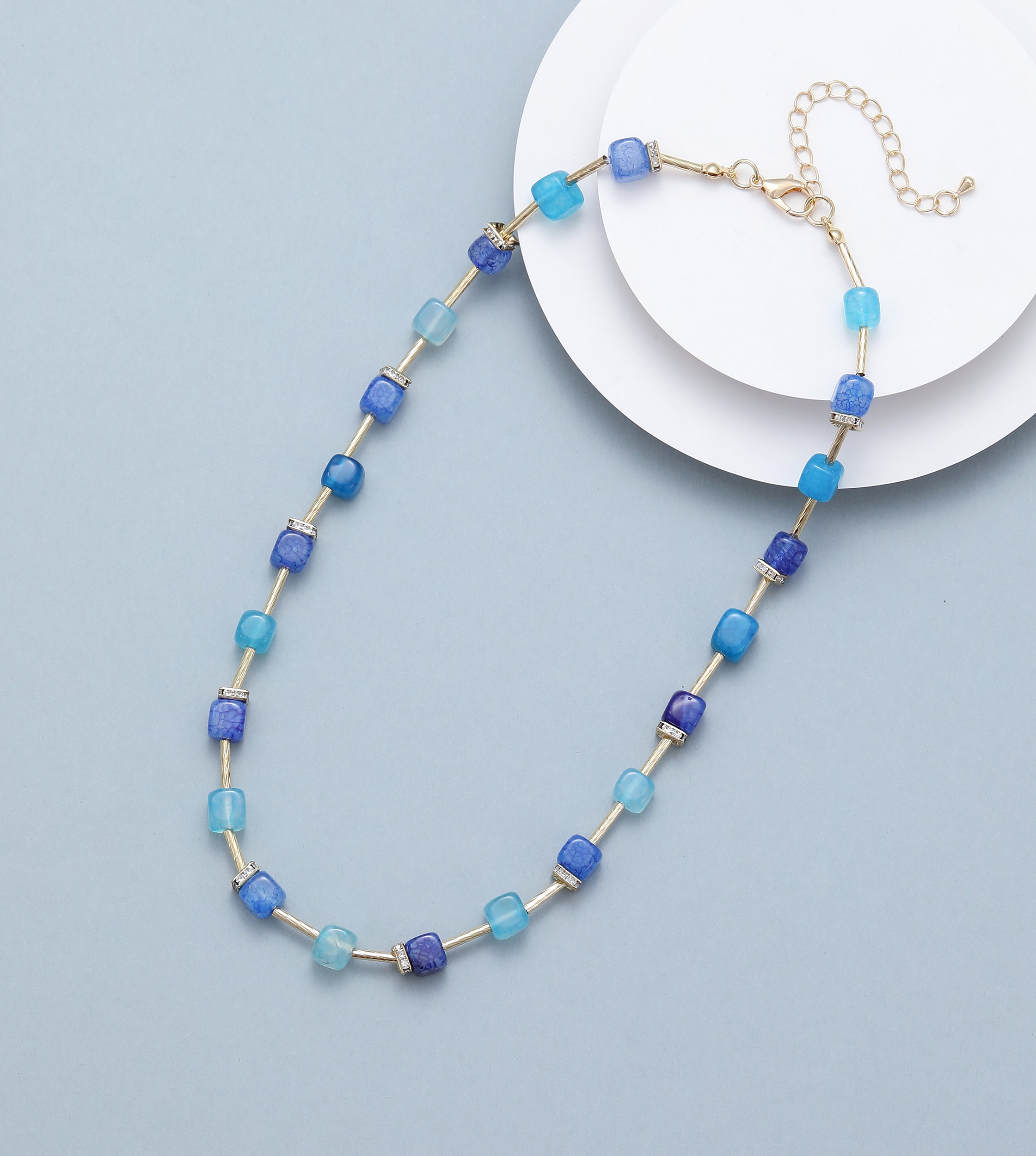 Short necklace, with aqua blue, true navy and sea blue polished-glass beads  - on a gold chain