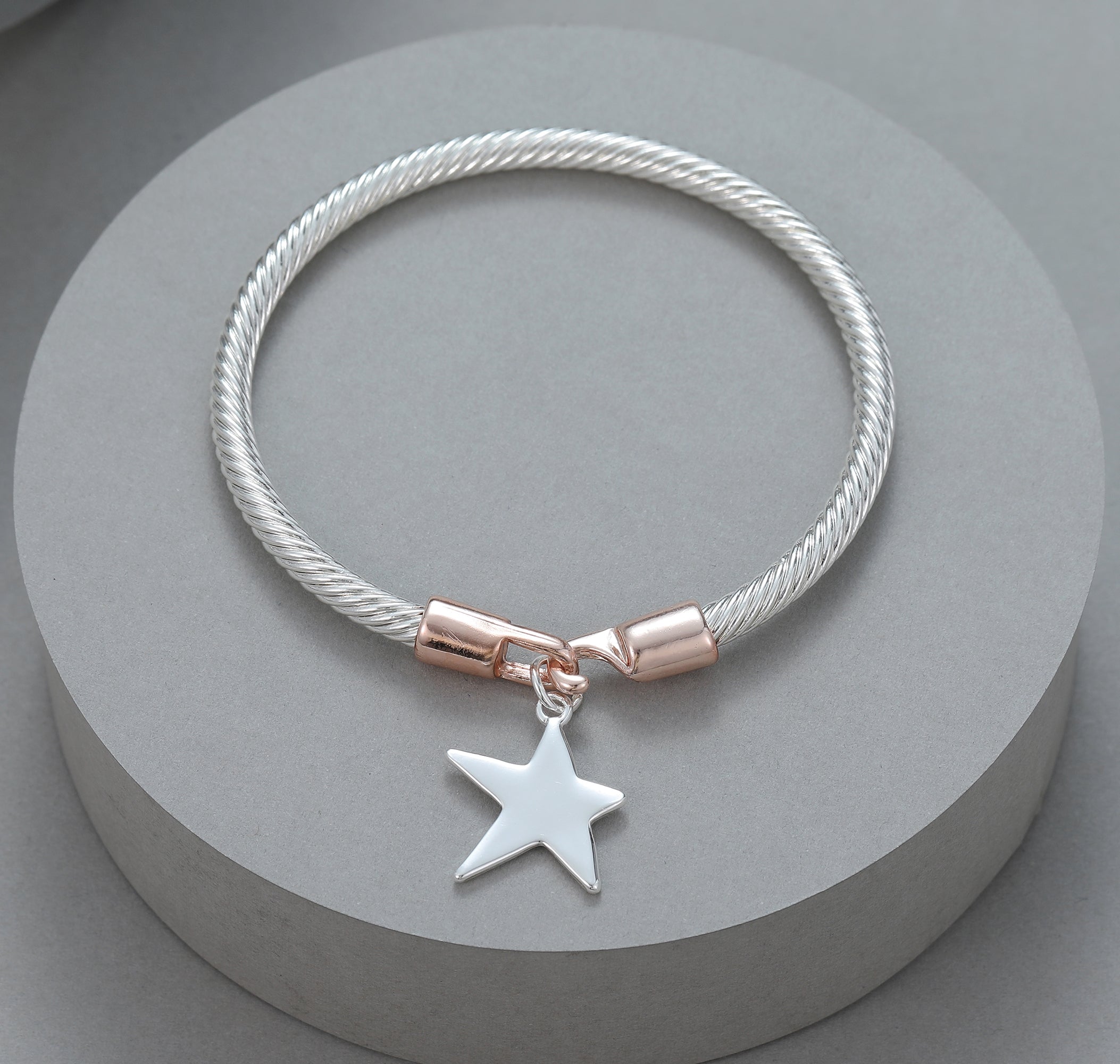 Clasp bracelet with rose gold & silver star pendant