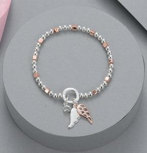 Two-tone elasticated bracelet with angel wing motif