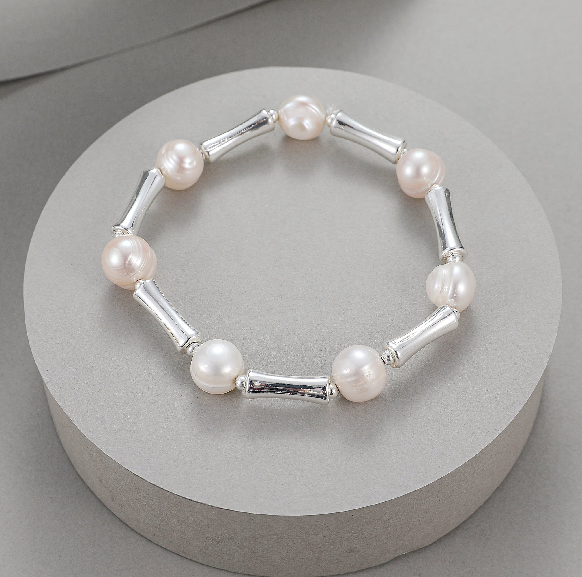 Mother of pearl elasticated bracelet with silver stations