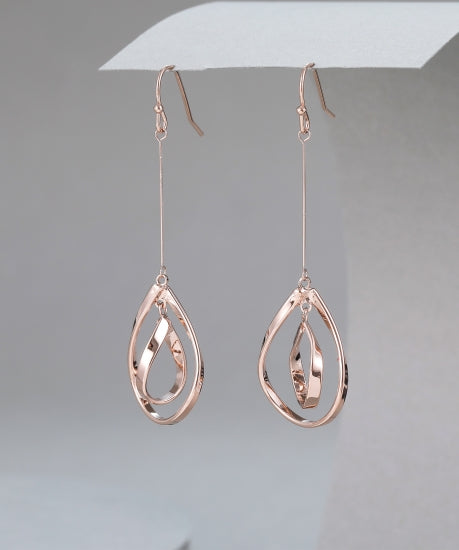 Open caged design earrings in rose gold tone