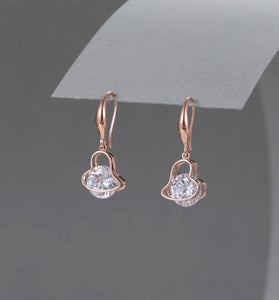 Cubic zirconia diamanté drop heart design earrings in rose gold tone