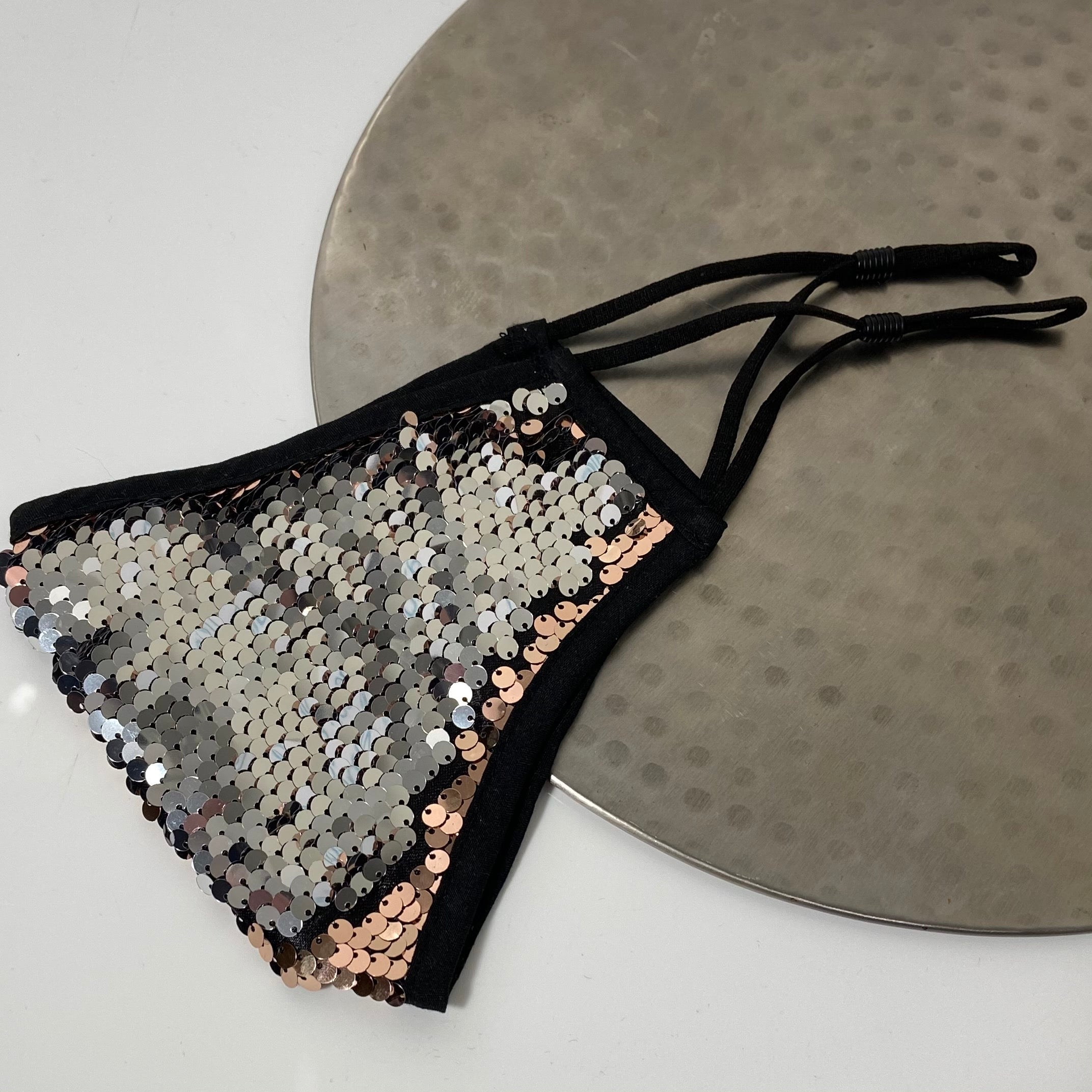 Moveable rose gold and silver glitter sequin face mask with adjustable earstrings