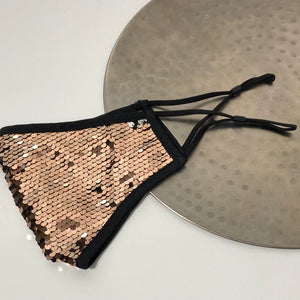 Moveable rose gold and silver glitter sequin face mask with adjustable earstrings