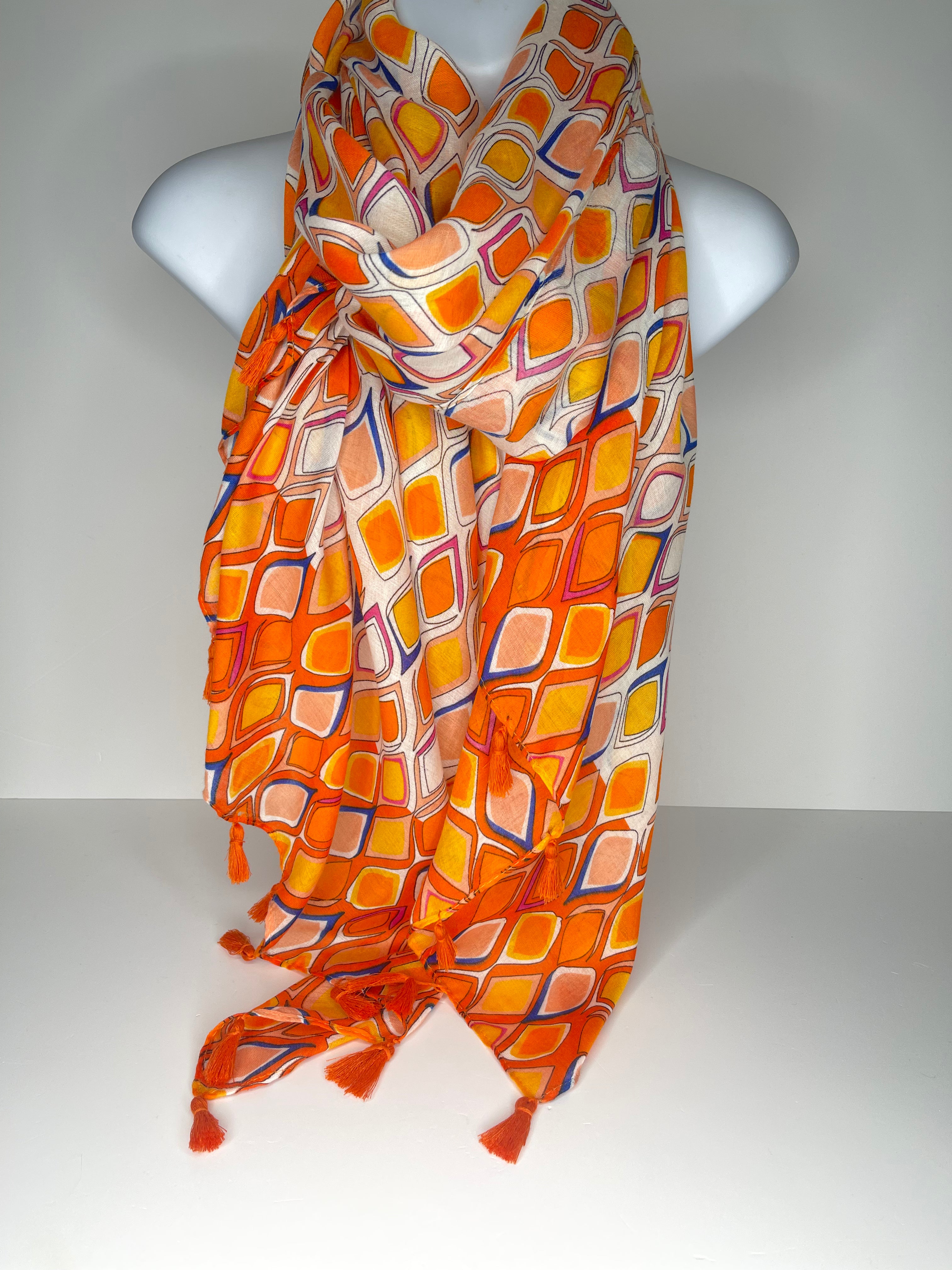 Orange and blue harlequin scarf with tassel ends