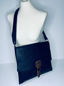 Vegan leather, cross-body satchel bag with top zip, magnetic dot closure and adjustable strap in navy