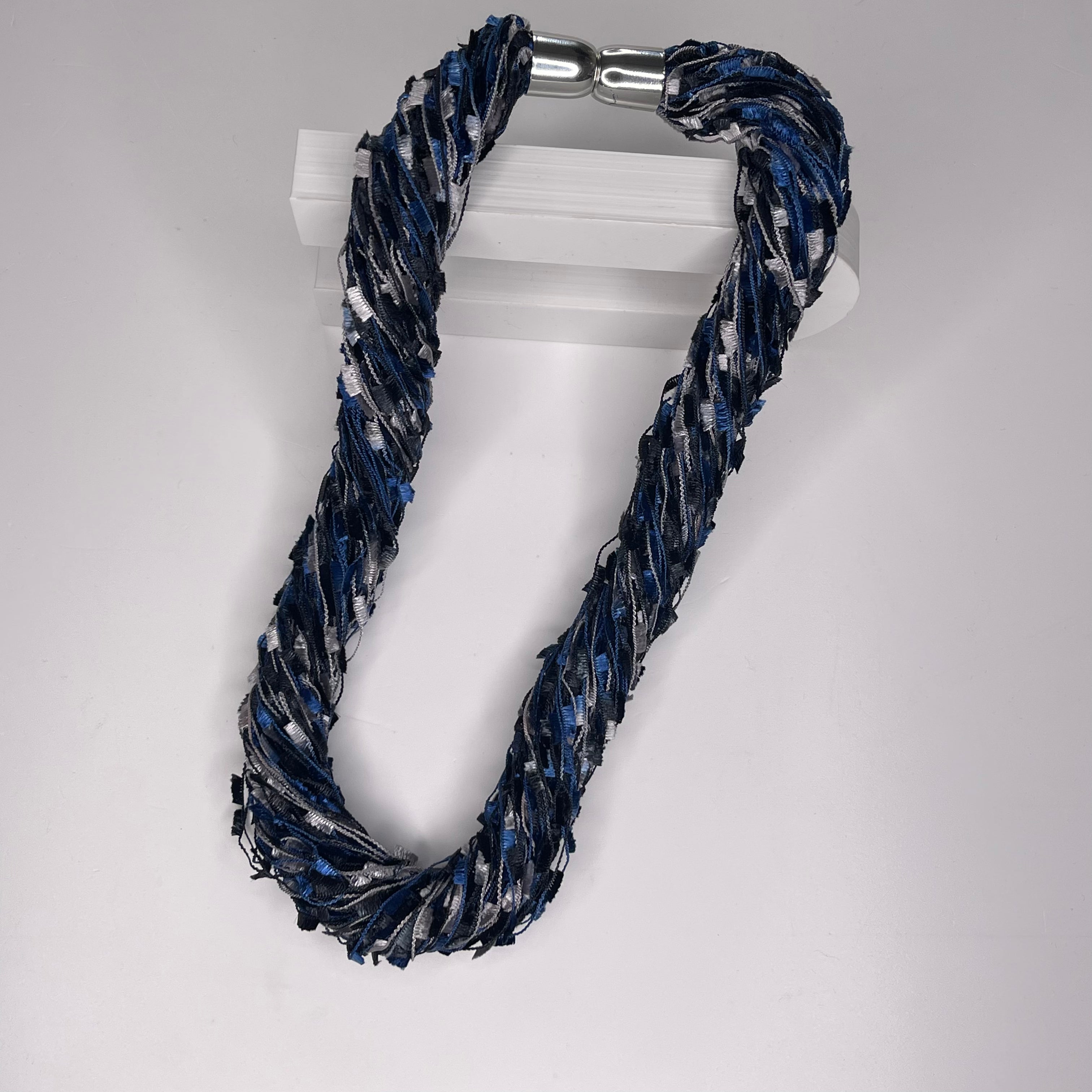Magnetic twist scarf necklace, in colours of navy, royal blue and grey